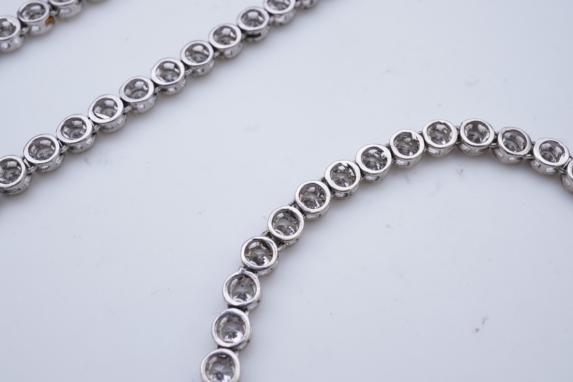 A cubic zirconia demi-parure